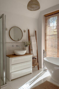 Feature a Wooden Ladder for Charming and Functional Towel Decor
