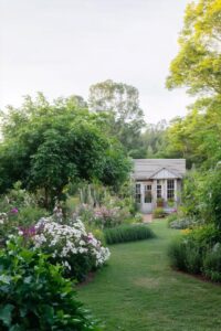 frame a garden pathway with lush mixed borders