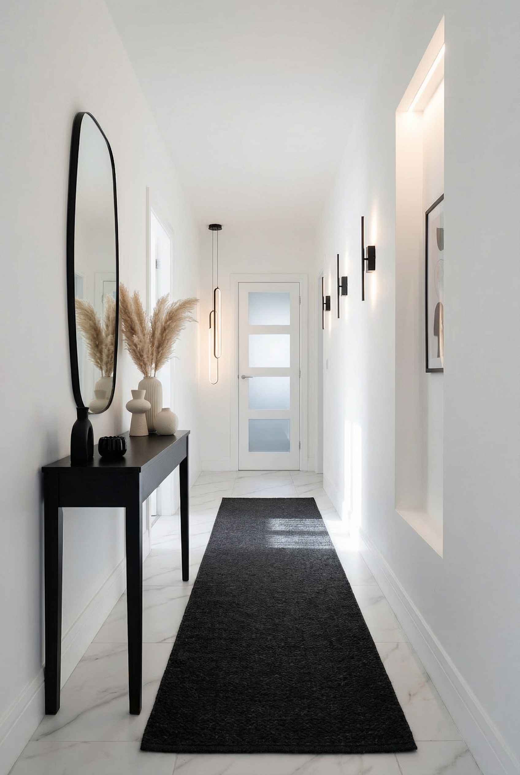 Use a Sleek Black Console Table for Modern Entryway Appeal